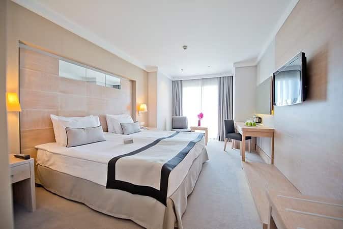 Chambre triple standard, vue sur le jardin