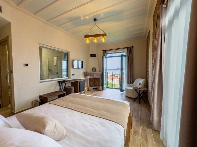 Zimmer mit Kamin, Meerblick