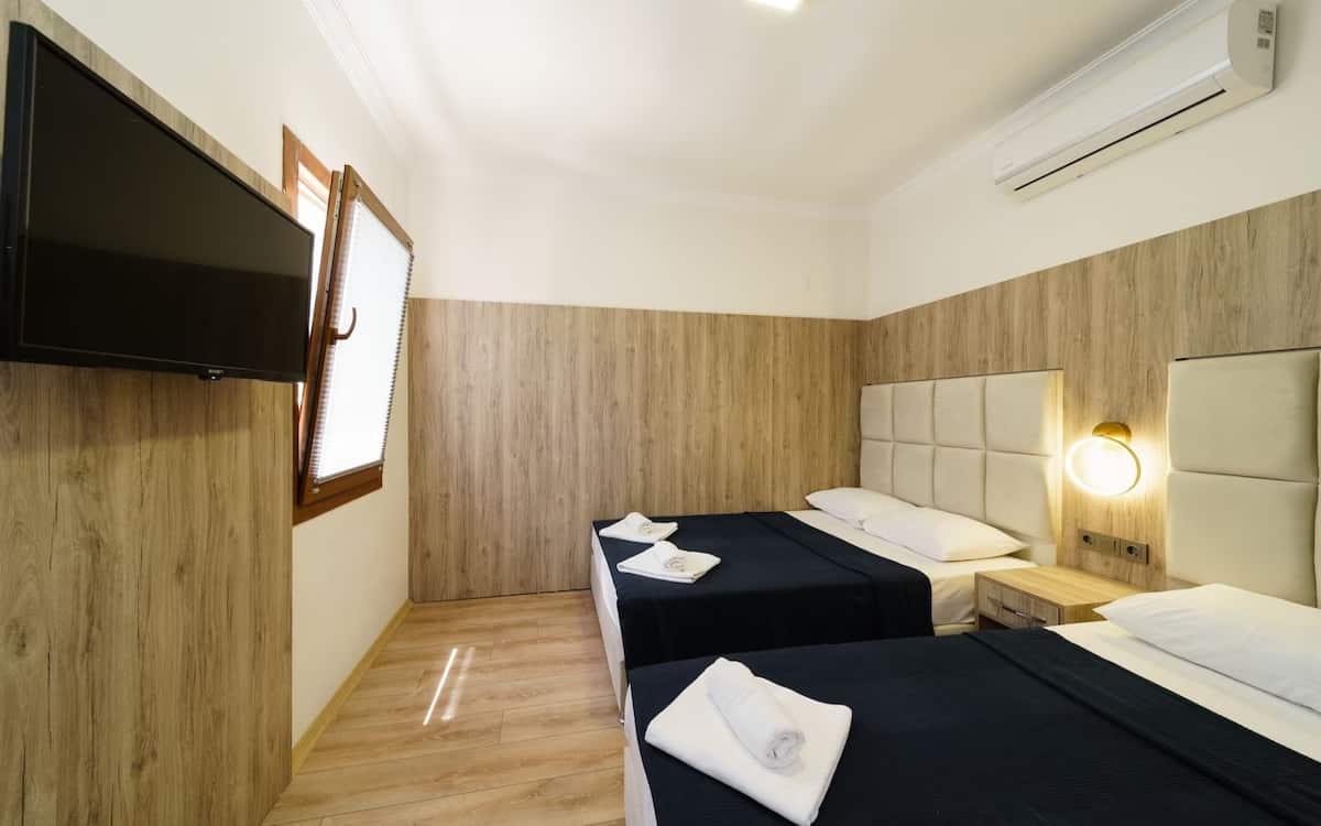 Dreibettzimmer
