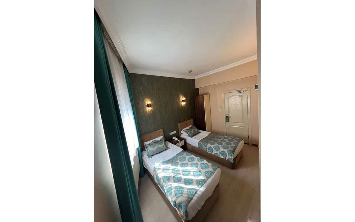 Doppelzimmer mit getrennten Betten