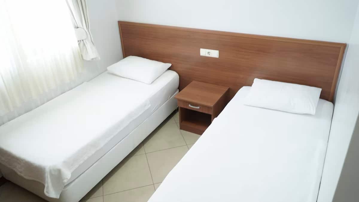 Doppelzimmer mit getrennten Betten