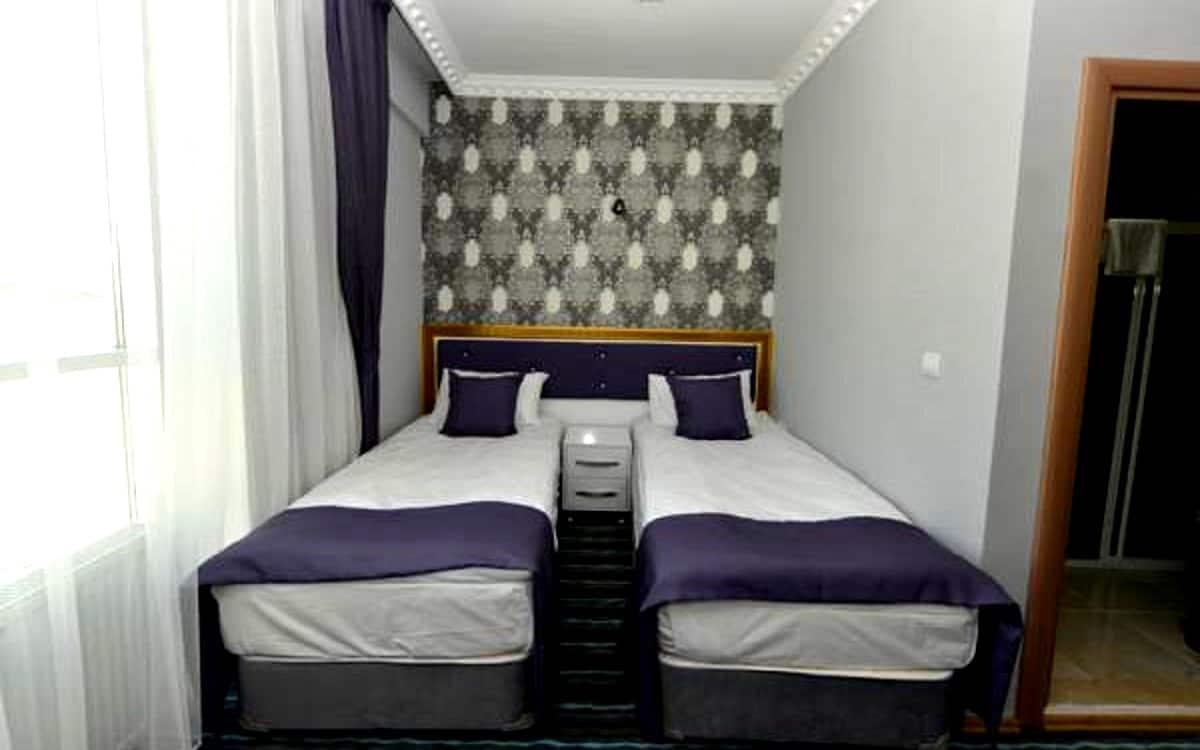 Doppelzimmer mit getrennten Betten