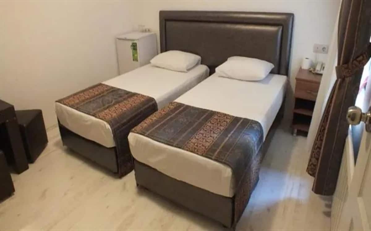 Doppelzimmer mit getrennten Betten