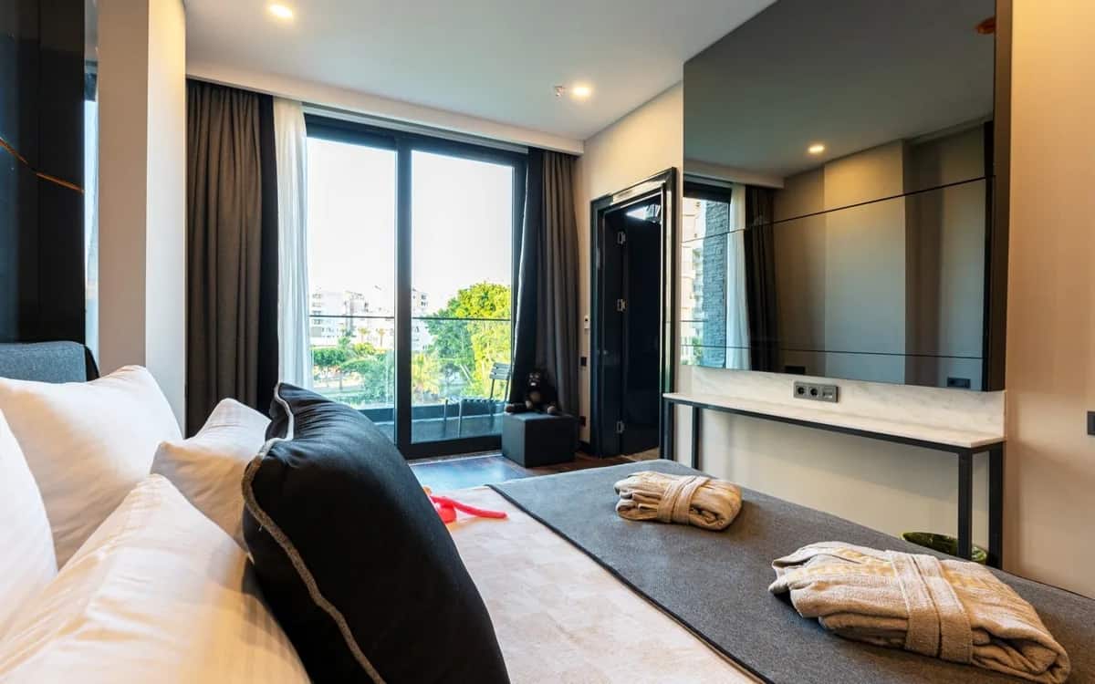 Deluxe-Dreibettzimmer mit Stadtblick