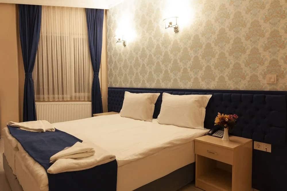 Standard-Dreibettzimmer