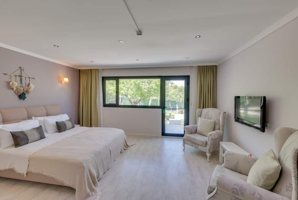 Gartenzimmer mit Balkon