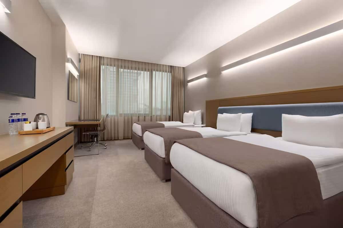 Deluxe-Zimmer mit 3 Einzelbetten