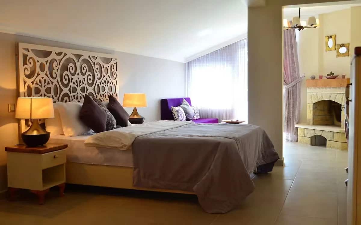 Deluxe-Zimmer mit Kamin und Balkon